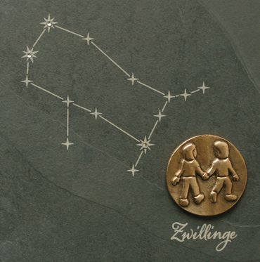 Bronzebild auf Schiefer "Sternzeichen"